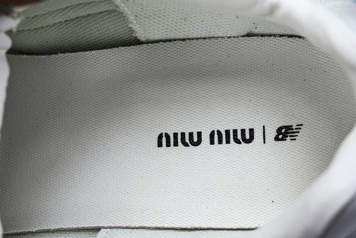 M*u M*u x New Ba1an*e Leather Sneakers UM001