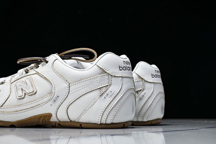 M*u M*u x New Ba1an*e Leather Sneakers UM001
