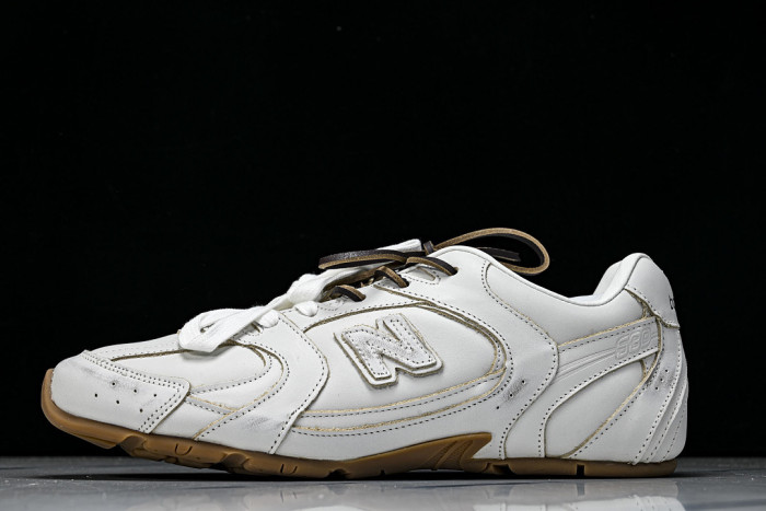 M*u M*u x New Ba1an*e Leather Sneakers UM001
