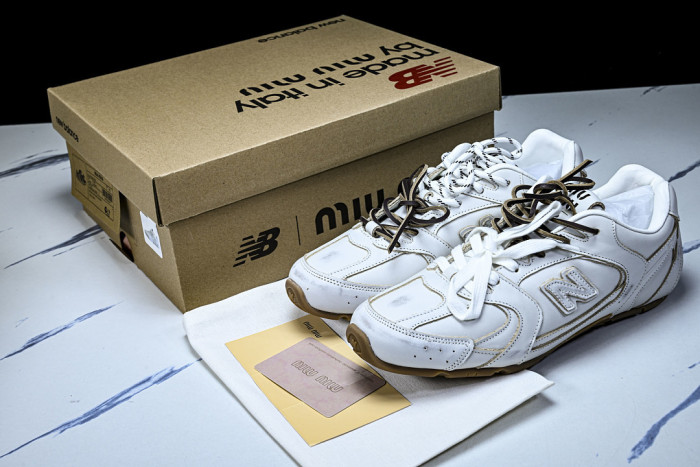M*u M*u x New Ba1an*e Leather Sneakers UM001